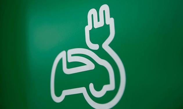 An electric car charging sign is seen at a EV charging station in Bangkok. (Reuters file photo) An electric car charging sign is seen at a EV charging station in Bangkok. (Reuters file photo)