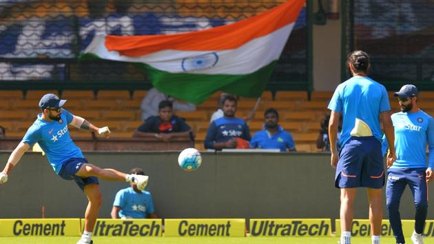 Virat Kohli and his Indian cricket teammates play a game of football during training at the M Chinnaswamy Stadium in Bangalore on Friday. The hosts will take on Australia cricket team in the second of the four-match Test series from Saturday. (AFP) Virat Kohli and his Indian cricket teammates play a game of football during training at the M Chinnaswamy Stadium in Bangalore on Friday. The hosts will take on Australia cricket team in the second of the four-match Test series from Saturday. (AFP)