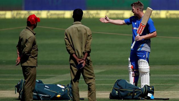 Australia's David Warner inspects the pitch ahead of their second test match. (REUTERS)