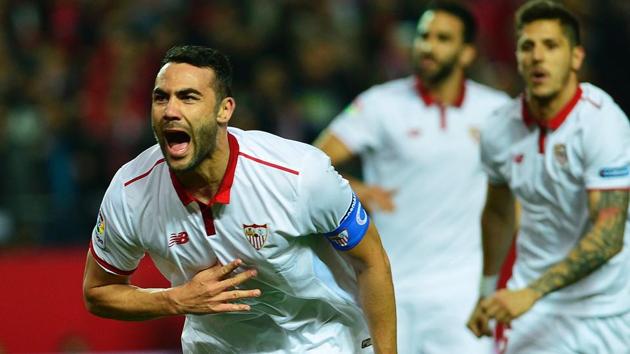 Sevilla's midfielder Vicente Iborra (left) celebrates after scoring against Athletic Bilbao during their Spanish La Liga match at the Ramon Sanchez Pizjuan stadium on Thursday. (AFP) Sevilla's midfielder Vicente Iborra (left) celebrates after scoring against Athletic Bilbao during their Spanish La Liga match at the Ramon Sanchez Pizjuan stadium on Thursday. (AFP)