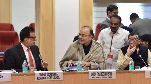 Finance minister Arun Jaitley with revenue secretary Hasmukh Adhia at a GST council meeting in New Delhi.(PTI)