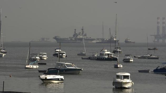 INS Viraat visible from Gateway of India as it arrives from Kochi for decommissioning in Mumbai on Friday, October 28, 2016. Till recently, It was the world's oldest surviving aircraft carrier. (Arijit Sen/HT PHOTO)