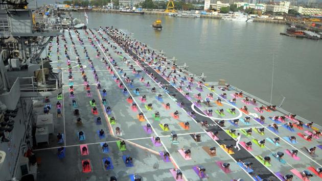 Indian Naval Cadets participates in a mass yoga demonstration on the deck of INS Viraat on the occasion of the 2nd International Yoga Day in Mumbai on June 21, 2016. (Sandeep mahankal/ht photo)