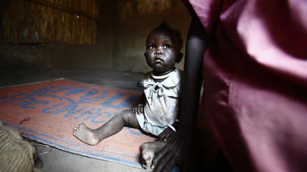 South Sudanese refugees are seen at a Refugee Waiting Centre in Al-Eligat area along the border in Sudan's White Nile state . (ASHRAF SHAZLY / AFP) South Sudanese refugees are seen at a Refugee Waiting Centre in Al-Eligat area along the border in Sudan's White Nile state . (ASHRAF SHAZLY / AFP)