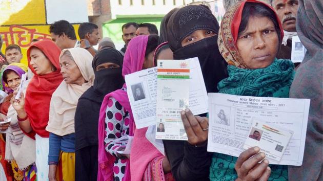 Women queue up at a polling booth in Amethi during the fifth phase of Assembly elections in Uttar Pradesh on February 27.(PTI Photo)