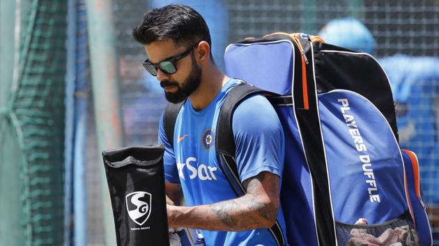 India's captain Virat Kohli leaves after batting in the nets during a training session ahead of their second cricket test match against Australia. (AP)