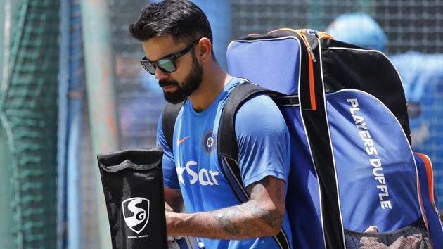 India cricket team captain Virat Kohli leaves after batting in the nets during a training session ahead of their second cricket test match against Australia in Bangalore. (AP) India cricket team captain Virat Kohli leaves after batting in the nets during a training session ahead of their second cricket test match against Australia in Bangalore. (AP)