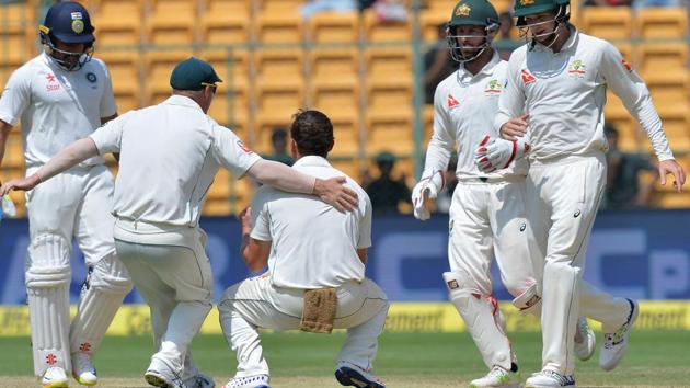 Australia cricket team’s Steve O'Keefe (centre), the hero of the first Test in Pune, celebrates the wicket of Karun Nair (left) during Day of the second Test M Chinnaswamy Stadium in Bangalore on Saturday. (AFP) Australia cricket team’s Steve O'Keefe (centre), the hero of the first Test in Pune, celebrates the wicket of Karun Nair (left) during Day of the second Test M Chinnaswamy Stadium in Bangalore on Saturday. (AFP)