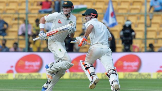 Australian batsmen David Warner (R) and Matthew Renshaw run between the wickets on Day 1 of the second Test in Bangalore on Saturday. Live streaming of Day 2 of India vs Australia will be available on Sunday.(AFP)