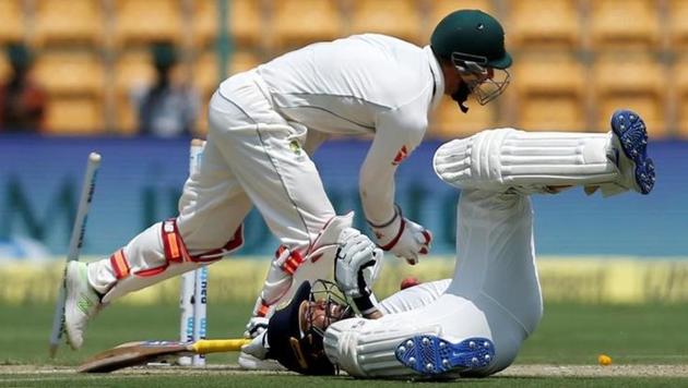 Australia cricket team wicketkeeper Matthew Wade stumps Ajinkya Rahane out, off the bowling of Nathan Lyon, on Day 1 of the second Test at M Chinnaswamy Stadium in Bangalore on Saturday. (Reuters) Australia cricket team wicketkeeper Matthew Wade stumps Ajinkya Rahane out, off the bowling of Nathan Lyon, on Day 1 of the second Test at M Chinnaswamy Stadium in Bangalore on Saturday. (Reuters)