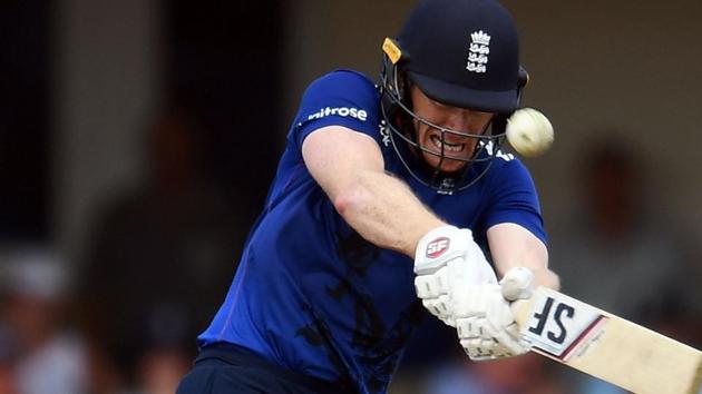 England cricket team captain Eoin Morgan hits a boundary during his century against the West Indies cricket team in the first ODI on Friday.(AFP)