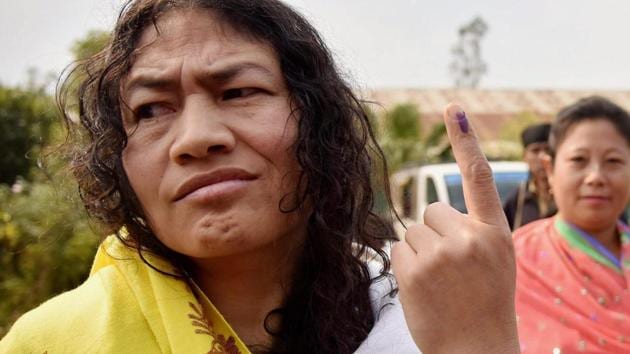 Irom Sharmila shows her finger marked with indelible ink after casting her vote at a polling station in Imphal on Saturday. (PTI) Irom Sharmila shows her finger marked with indelible ink after casting her vote at a polling station in Imphal on Saturday. (PTI)