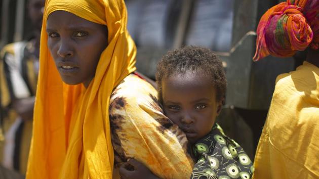 A woman and a child seen  in the drought-affected village of Bandarero, near Moyale town on the Ethiopian border, in northern Kenya. (Ben Curtis/ AP) 