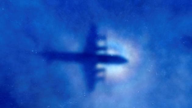 The shadow of a Royal New Zealand Air Force (RNZAF) P3 Orion maritime search aircraft can be seen on low-level clouds as it flies over the southern Indian Ocean looking for missing Malaysian Airlines flight MH370.(Reuters File)