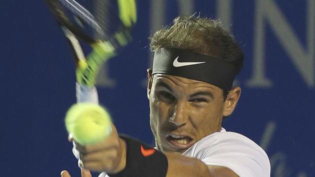 Spain's Rafael Nadal returns to Croatia's Marini Cilic during their Mexican Open semifinal match in Acapulco on Friday. (AP) Spain's Rafael Nadal returns to Croatia's Marini Cilic during their Mexican Open semifinal match in Acapulco on Friday. (AP)