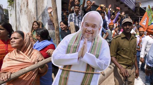 Enthusiastic supporters seen during the road show in Varanasi . (Arun Sharma/HT PHOTO)