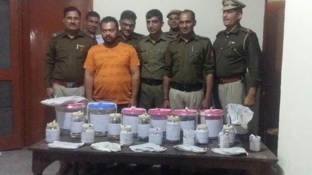 The arms and ammunition recovered from the room of Manish’s domestic help. (HT PHOTO) The arms and ammunition recovered from the room of Manish’s domestic help. (HT PHOTO)