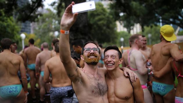 A couple takes a selfie during the festival. They instead favour a free vote in parliament, a move supported by many gay rights campaigners. For those enjoying the spectacle Saturday night, it was clear where their preference lay. (Steven Saphore/REUTERS) A couple takes a selfie during the festival. They instead favour a free vote in parliament, a move supported by many gay rights campaigners. For those enjoying the spectacle Saturday night, it was clear where their preference lay. (Steven Saphore/REUTERS)