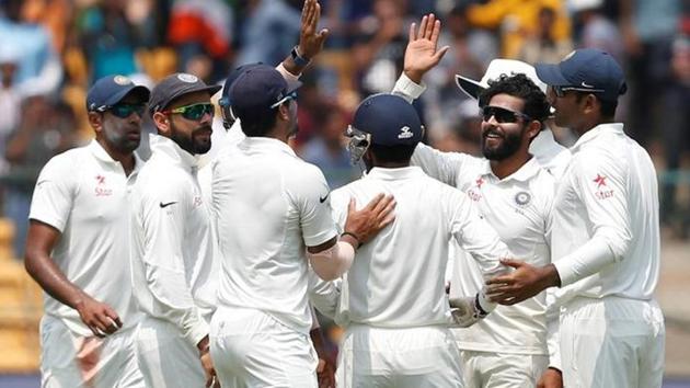 India cricket team spinner Ravindra Jadeja (2nd R) celebrates the wicket of Australia cricket team's Matt Renshaw mates on Day 2 of the second Test at M Chinnaswamy Stadium in Bangalore on Sunday. (REUTERS) India cricket team spinner Ravindra Jadeja (2nd R) celebrates the wicket of Australia cricket team's Matt Renshaw mates on Day 2 of the second Test at M Chinnaswamy Stadium in Bangalore on Sunday. (REUTERS)
