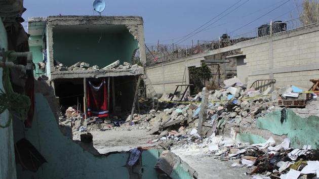A home is surrounded by rubble from an explosion in the Mexico City suburb Tultepec on March 4. (AP Photo) A home is surrounded by rubble from an explosion in the Mexico City suburb Tultepec on March 4. (AP Photo)