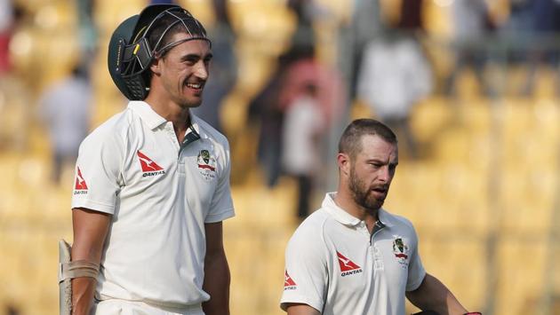 Australia's Mitchell Starc (left) and Matthew Wade leave the field at the end of the second day's play. Wade was on 25 and Starc was on 14 respectively. (AP) Australia's Mitchell Starc (left) and Matthew Wade leave the field at the end of the second day's play. Wade was on 25 and Starc was on 14 respectively. (AP)