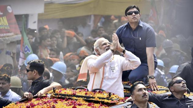 Prime Minister Narendra Modi during the road show in Varanasi on Saturday. (Arun Sharma/Hindustan Times) Prime Minister Narendra Modi during the road show in Varanasi on Saturday. (Arun Sharma/Hindustan Times)