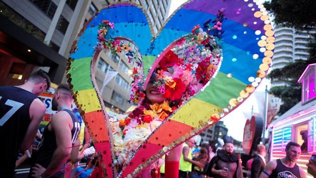 A participant in the annual Sydney Gay and Lesbian Mardi Gras festival wears a rainbow coloured heart outfit. The defence forces, police and firefighters all sent contingents to march in uniform, and the surf lifesavers were a crowd favourite in their swimming trunks. (Jason Reed/REUTERS) A participant in the annual Sydney Gay and Lesbian Mardi Gras festival wears a rainbow coloured heart outfit. The defence forces, police and firefighters all sent contingents to march in uniform, and the surf lifesavers were a crowd favourite in their swimming trunks. (Jason Reed/REUTERS)