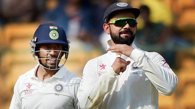 India cricket team skipper Virat Kohli asking a review during the 2nd day of the Test match against Australia in Bangalore.(PTI)