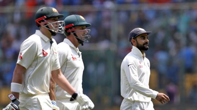 India took six wickets on Day 2 of the second Test between India and Australia in Bangalore but fifties by Matt Renshaw (left) and Shaun Marsh will give Virat Kohli (right) plenty to think about. At stumps, Australia were 237/6, with a handy lead of 48 runs. (AP) India took six wickets on Day 2 of the second Test between India and Australia in Bangalore but fifties by Matt Renshaw (left) and Shaun Marsh will give Virat Kohli (right) plenty to think about. At stumps, Australia were 237/6, with a handy lead of 48 runs. (AP)
