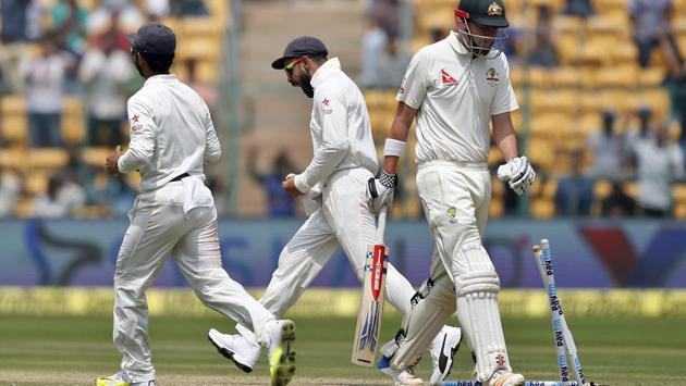 India captain Virat Kohli (centre) celebrates the dismissal of Renshaw. Renshaw was stumped by Jadeja on 60 off 196 balls. (AP) India captain Virat Kohli (centre) celebrates the dismissal of Renshaw. Renshaw was stumped by Jadeja on 60 off 196 balls. (AP)