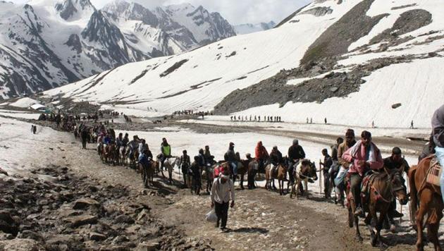 Pilgrims on the Amarnath Yatra in the Himalayas. Pilgrims on the Amarnath Yatra in the Himalayas.
