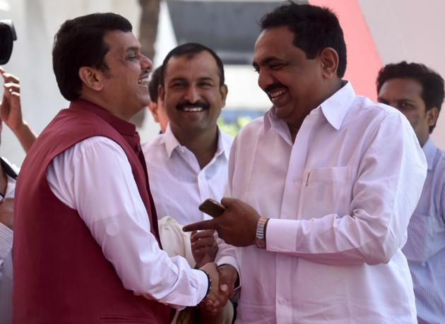 Chief minister Devendra Fadnavis shares a light moment with NCP MLA Jayant Patil on the first day of Maharashtra Assembly session in Mumbai on Monday. (Kunal Patil/HT Photo) Chief minister Devendra Fadnavis shares a light moment with NCP MLA Jayant Patil on the first day of Maharashtra Assembly session in Mumbai on Monday. (Kunal Patil/HT Photo)