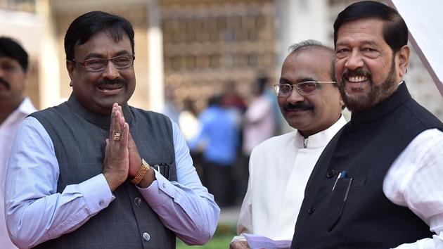 BJP leaders Sudhir Mungantiwar and Girish Bapat outside Vidhan Bhavan. (Kunal Patil/HT Photo)