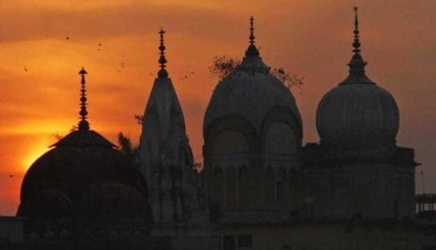 Birds fly at sunset over a Hindu temple in Ayodhya. AP File Photo
