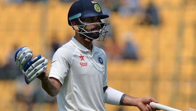 Indian cricket team skipper Virat Kohli reacts as he walks back to the pavilion after losing his wicket against Australia in Bangalore. (AFP) Indian cricket team skipper Virat Kohli reacts as he walks back to the pavilion after losing his wicket against Australia in Bangalore. (AFP)