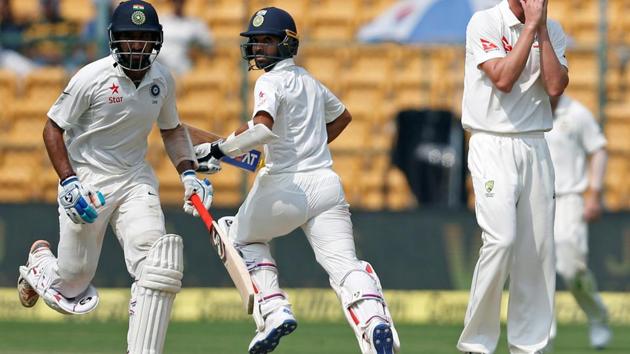 India cricket team’s Cheteshwar Pujara (79 n.o) and Ajinkya Rahane (40 n.o.) have put the hosts in a comfortable position, sharing an unbeaten 93-run partnership during Day 3 of the second Test at M Chinnaswamy Stadium in Bangalore on Monday. (REUTERS)