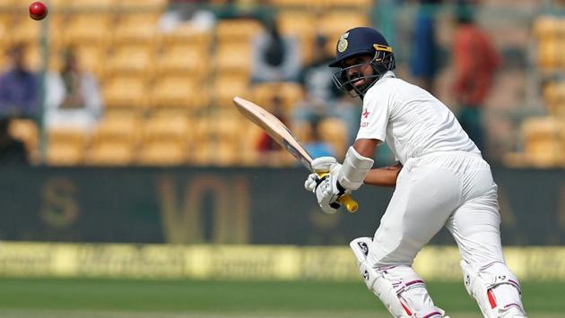 Though Ajinkya Rahane was the less aggressor in the partnership with Cheteshwar Pujara, he scored three boundaries, latching onto the loose balls on Day 3 of the second Test at M Chinnaswamy Stadium in Bangalore on Monday. (REUTERS)
