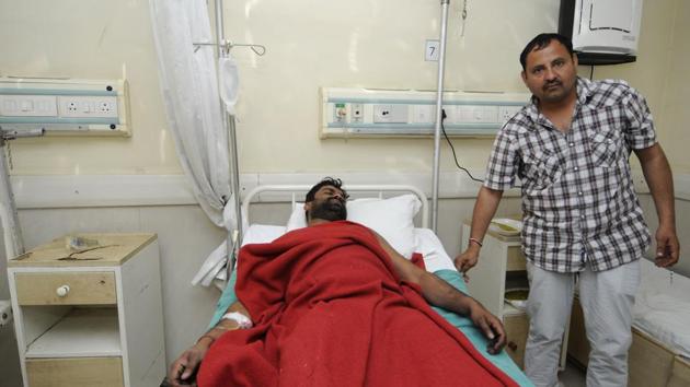 Avnesh was injured in his leg and was admitted to the district hospital in Noida. (Sunil Ghosh/HT Photo) Avnesh was injured in his leg and was admitted to the district hospital in Noida. (Sunil Ghosh/HT Photo)
