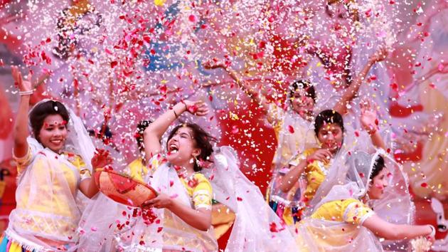 University students celebrate Phoolon ki Holi in Gurgaon. (Parveen Kumar/ht photo)