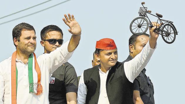 Uttar Pradesh Chief Minister and Samajwadi Party leader Akhilesh Yadav (R) and Congress vice president Rahul Gandhi (L) waving to the crowd during a joint roadshow in Varanasi. (AFP File Photo) Uttar Pradesh Chief Minister and Samajwadi Party leader Akhilesh Yadav (R) and Congress vice president Rahul Gandhi (L) waving to the crowd during a joint roadshow in Varanasi. (AFP File Photo)