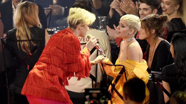 Katy Perry (left) sings with Halsey. (Chris Pizzello/Invision/AP) Katy Perry (left) sings with Halsey. (Chris Pizzello/Invision/AP)