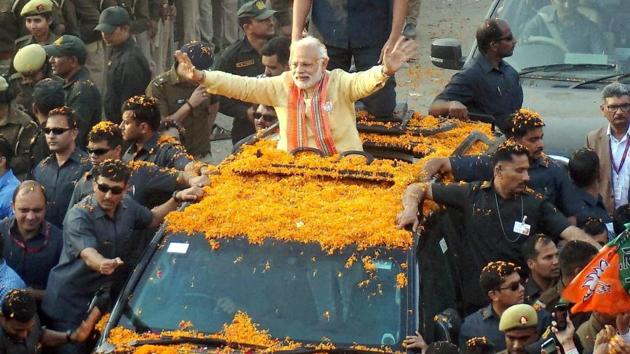Prime Minister Narendra Modi during his roadshow in Varanasi on Sunday.(PTI Photo) Prime Minister Narendra Modi during his roadshow in Varanasi on Sunday.(PTI Photo)