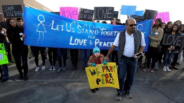 Four-year-old Kyla Ryan leads a march for Srinivas Kuchibhotla, an Indian engineer who was shot at a bar in Olathe in Kansas.(Reuters File)