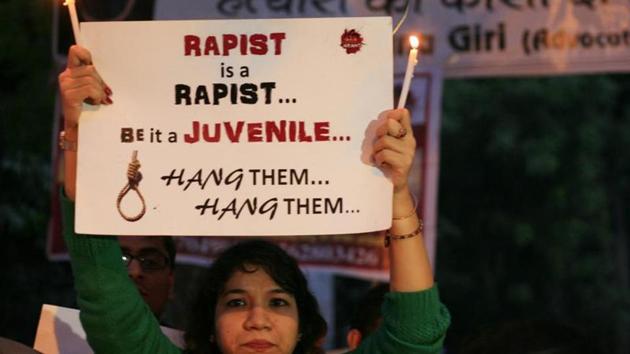 A student activist shows a placard during a protest against the December 16 gang rape in New Delhi. (Hi File) A student activist shows a placard during a protest against the December 16 gang rape in New Delhi. (Hi File)