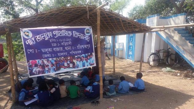 This is how the students of the Par Bhaluka Primary School have been attending classes since 2013. (HT Photo) This is how the students of the Par Bhaluka Primary School have been attending classes since 2013. (HT Photo)