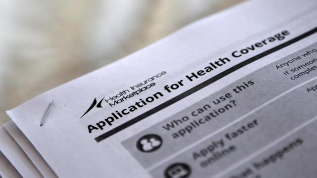 The federal government forms for applying for health coverage are seen at a rally held by supporters of the Affordable Care Act, widely referred to as "Obamacare", outside the Jackson-Hinds Comprehensive Health Center in Jackson, Mississippi, U.S. on October 4, 2013.(REUTERS)