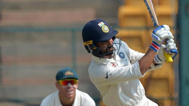 But the damage was done, much before Josh Hazlewood’s inspired bowling, by Ajinkya Rahane, who scored a fighting 52 partnering Cheteshwar Pujara in the second Test at M Chinnaswamy Stadium. (AFP) But the damage was done, much before Josh Hazlewood’s inspired bowling, by Ajinkya Rahane, who scored a fighting 52 partnering Cheteshwar Pujara in the second Test at M Chinnaswamy Stadium. (AFP)