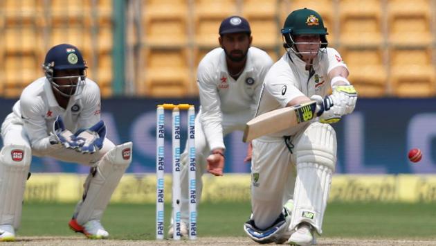 Australia cricket team captain Steve Smith tried to attack the India bowlers but fell for 28 to Umesh Yadav on Day 4 of the second Test at M Chinnaswamy Stadium on Tuesday. (REUTERS) Australia cricket team captain Steve Smith tried to attack the India bowlers but fell for 28 to Umesh Yadav on Day 4 of the second Test at M Chinnaswamy Stadium on Tuesday. (REUTERS)