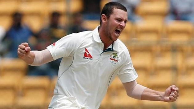 Josh Hazlewood celebrates after taking a wicket against India on Day 4 of the Bangalore Test. (REUTERS) Josh Hazlewood celebrates after taking a wicket against India on Day 4 of the Bangalore Test. (REUTERS)