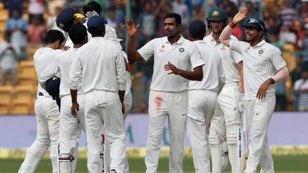 Indian cricket team players celebrate after winning the second Test match against Australia in Bangalore.(REUTERS)